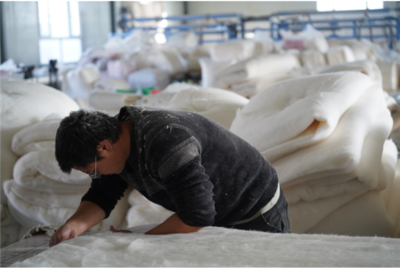 产业集群:库尔勒棉花到棉被 原产地系列流程一次性完成